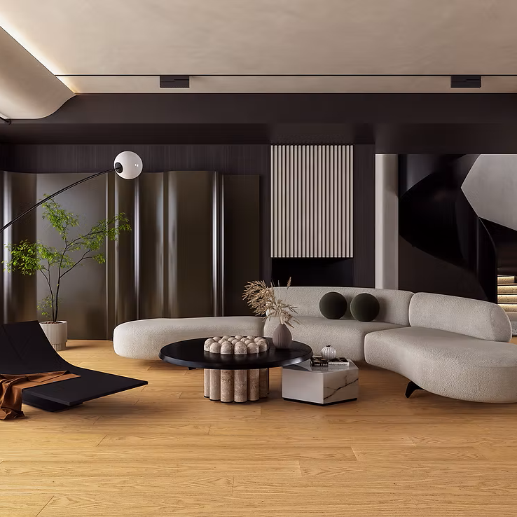 Modern living room with a sectional sofa, coffee table, and decorative items.